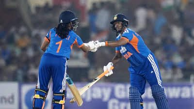 India Women players celebrate a wicket during the Raipur T20I
