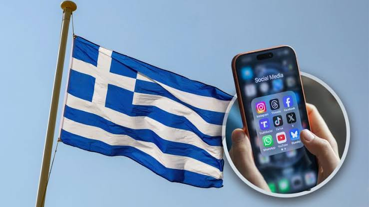Smartphone screen showing social media icons and an age verification prompt