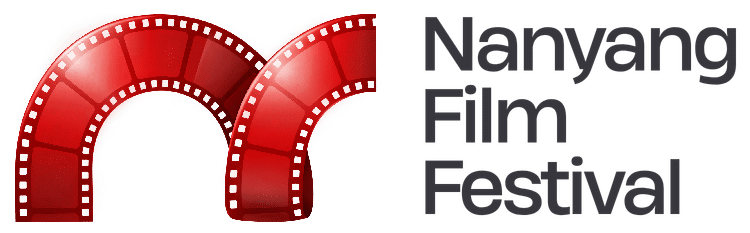 Audience and screens at Nanyang Film Festival opening ceremony in Jakarta