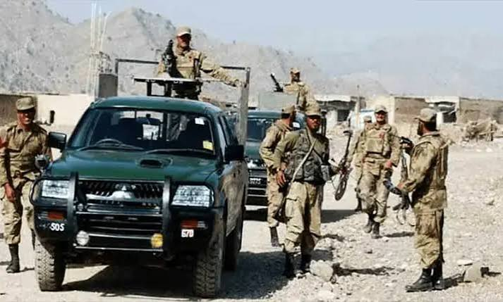 Pakistani soldiers patrol a rugged border area in North Waziristan