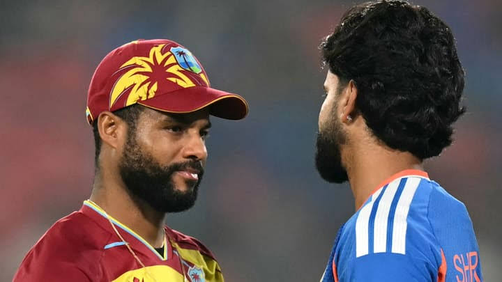 Shai Hope celebrating century with teammates during West Indies T20I in Hyderabad
