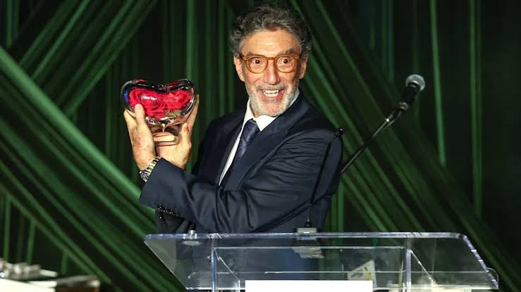 Chuck Lorre onstage at a Los Angeles charity gala accepting an award