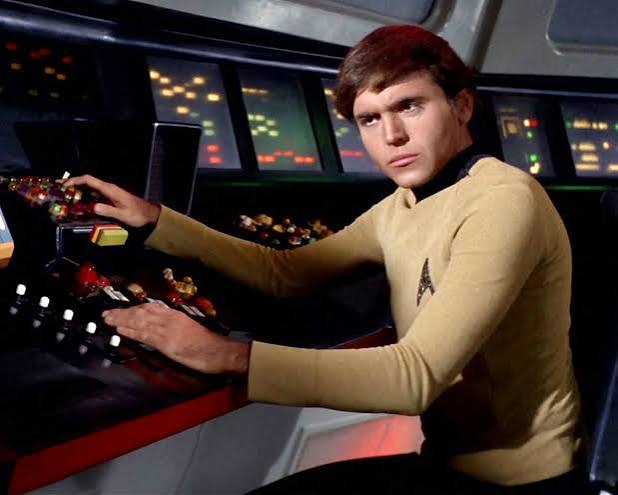 Walter Koenig smiling at a convention, in mid-age portrait
