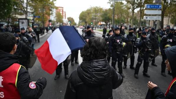 Police lined up during protests in a French city