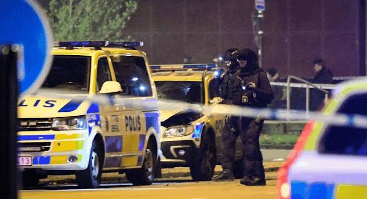 Swedish police investigators at financial crime unit office